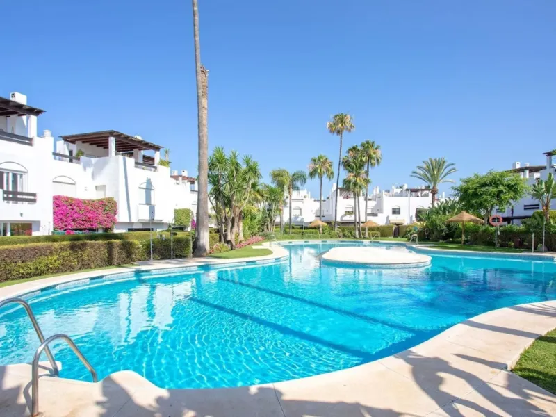 Discover this exclusive townhouse just steps from the beach, located in one of the most sought-after areas of Marbella, on the beachfront of Guadalmina Baja/San Pedro de Alcántara.