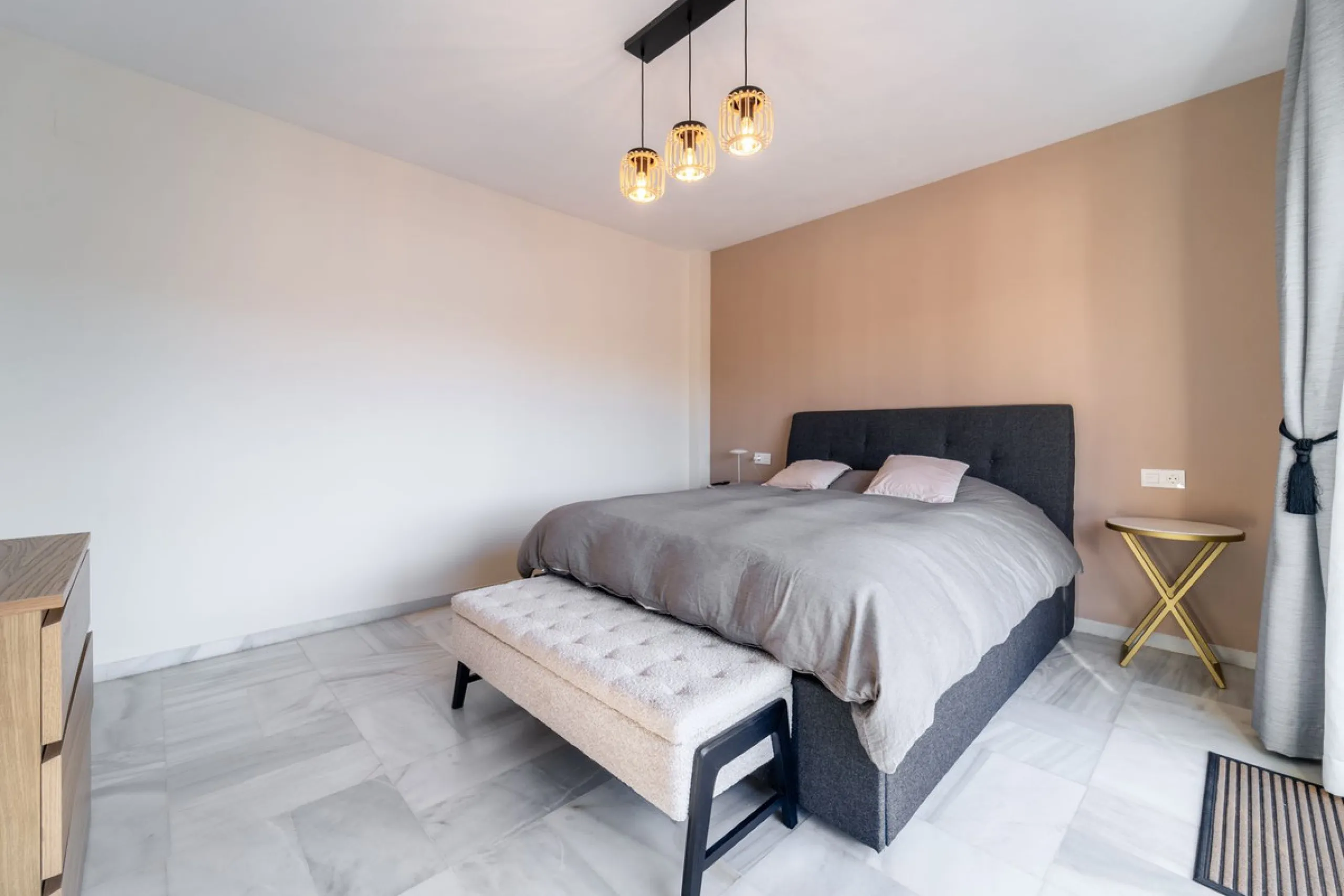 Located in the prestigious area of Nagüeles, Marbella, this elegant 3-bedroom, 3-bathroom duplex apartment occupies the first and second (top) floors of the sought-after Urb. Pueblo Bermejo, offering privacy, comfort, and an exceptional residential settin