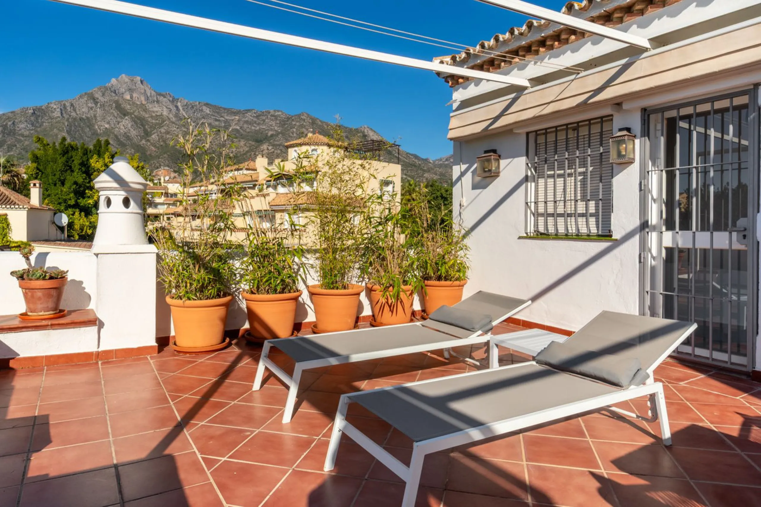 Located in the prestigious area of Nagüeles, Marbella, this elegant 3-bedroom, 3-bathroom duplex apartment occupies the first and second (top) floors of the sought-after Urb. Pueblo Bermejo, offering privacy, comfort, and an exceptional residential settin
