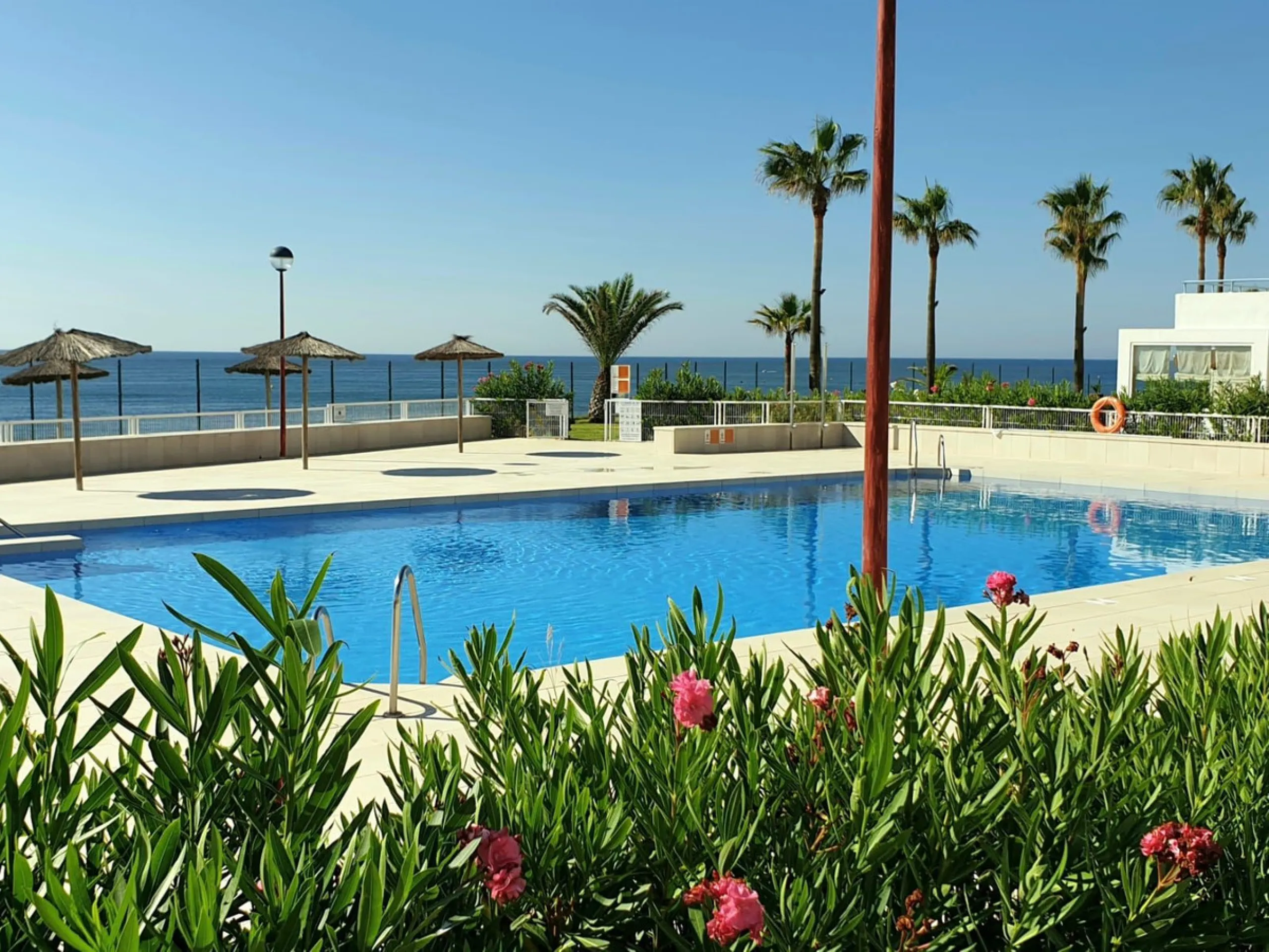 Exclusive South-Facing Beachfront Townhouse with Panoramic Sea Views in Bahía de Casares – Costa del Sol