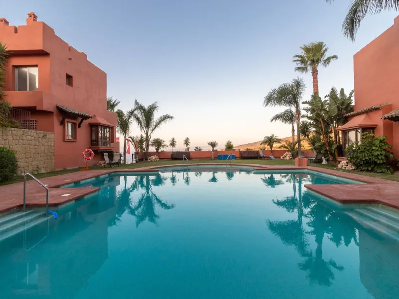 Exceptional Corner Townhouse with Panoramic Sea Views.