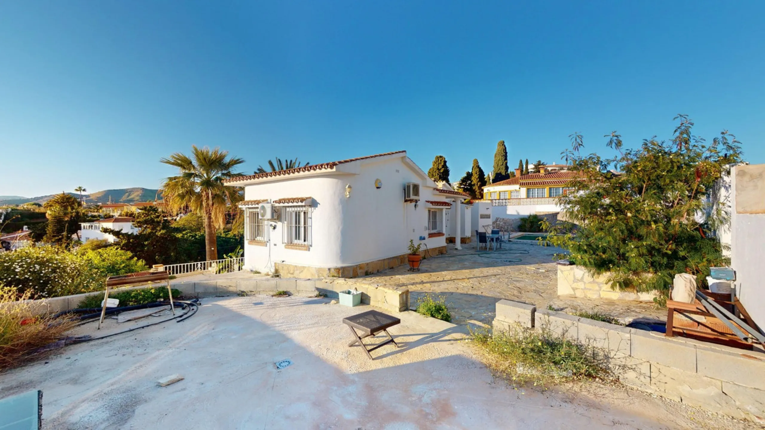 Discover your dream home in the charming seaside village of Benajarafe! This beautifully modernized property offers everything you need for luxurious Mediterranean living. The main house features two spacious bedrooms and a sleek, contemporary bathroom. A