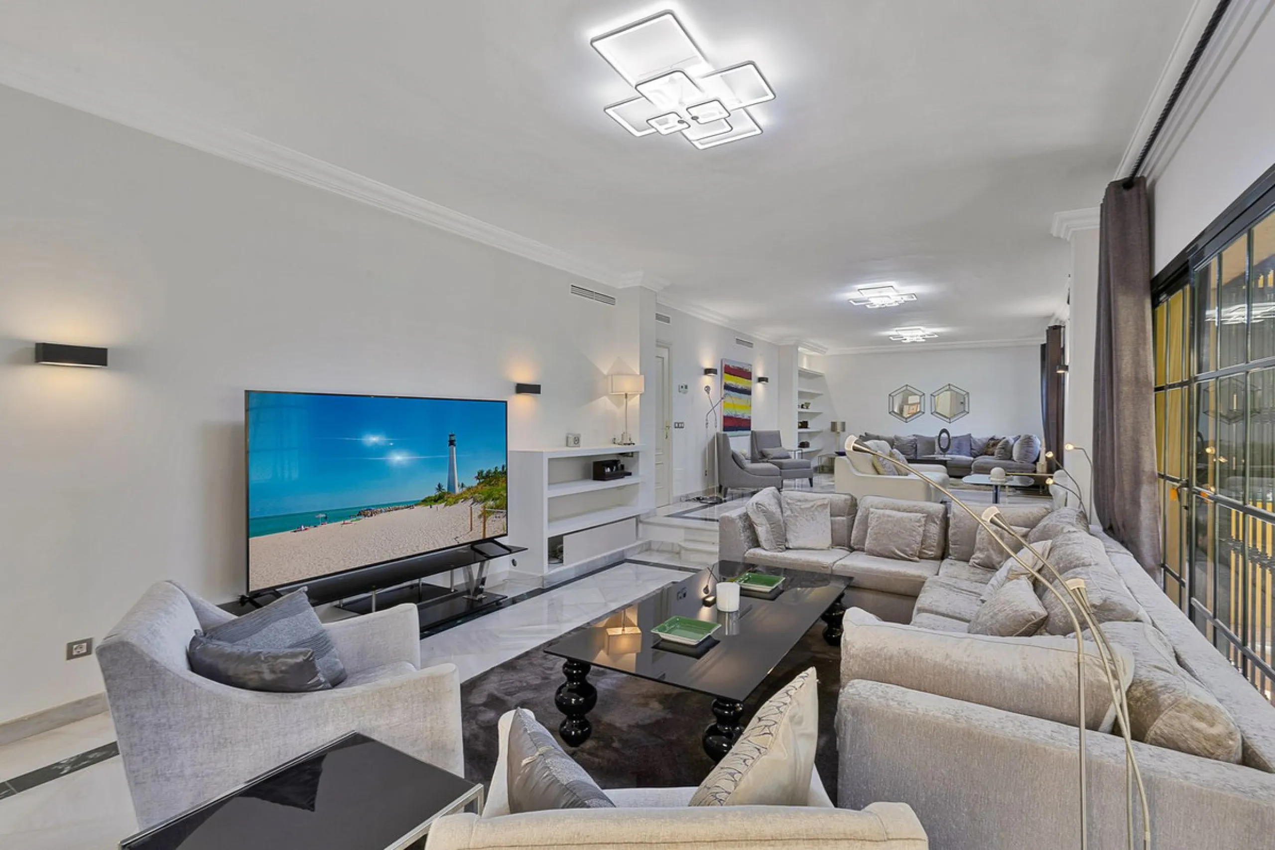 This classic Andalusian-style villa, set within the prestigious residential enclave of Casasola, Guadalmina Baja, represents a rare opportunity to acquire a substantial family home just moments from the sea, with exceptional scope for refurbishment and pe