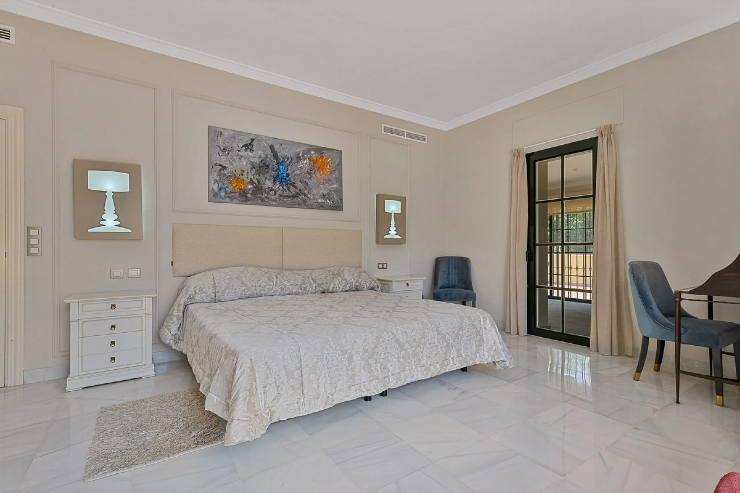 This classic Andalusian-style villa, set within the prestigious residential enclave of Casasola, Guadalmina Baja, represents a rare opportunity to acquire a substantial family home just moments from the sea, with exceptional scope for refurbishment and pe