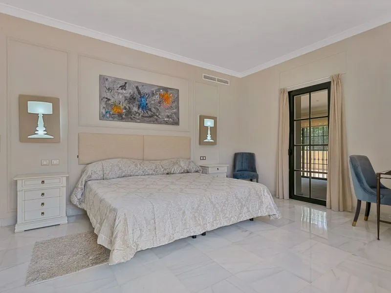 This classic Andalusian-style villa, set within the prestigious residential enclave of Casasola, Guadalmina Baja, represents a rare opportunity to acquire a substantial family home just moments from the sea, with exceptional scope for refurbishment and pe