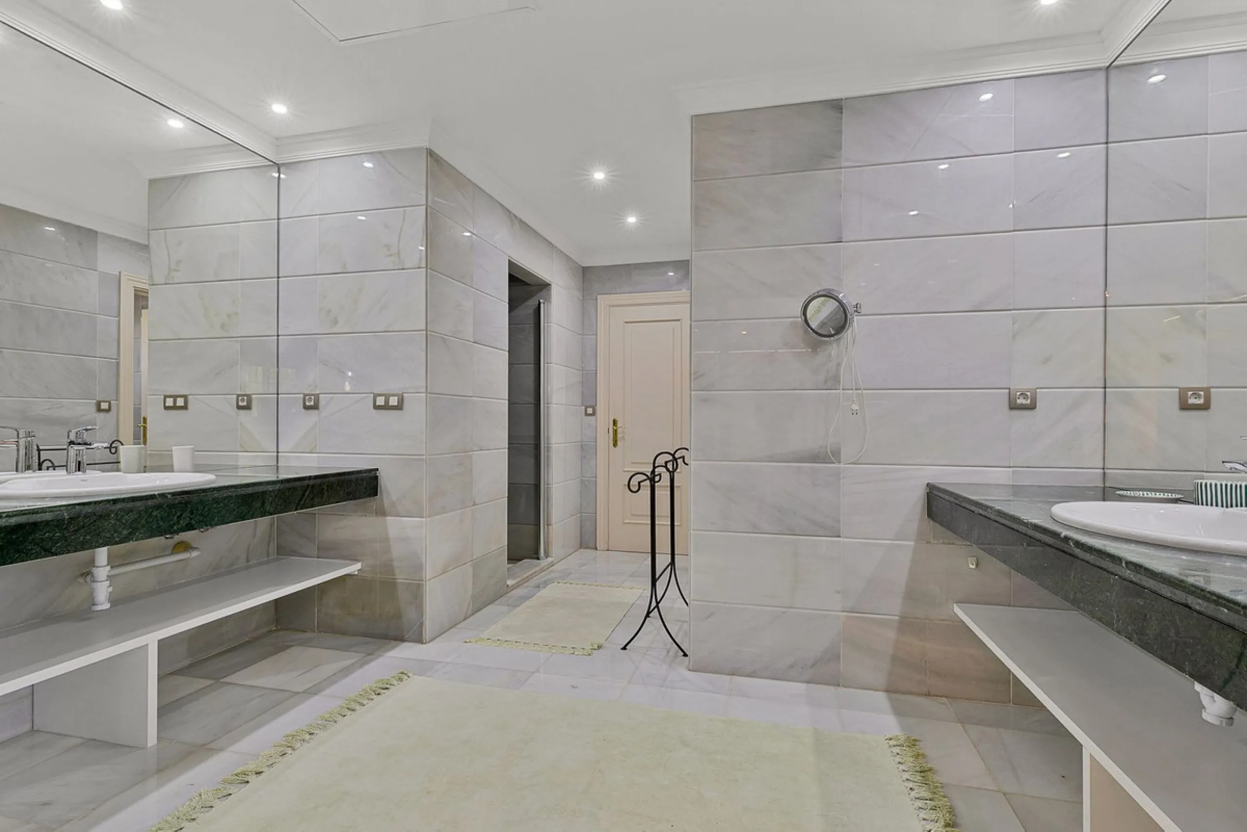 This classic Andalusian-style villa, set within the prestigious residential enclave of Casasola, Guadalmina Baja, represents a rare opportunity to acquire a substantial family home just moments from the sea, with exceptional scope for refurbishment and pe