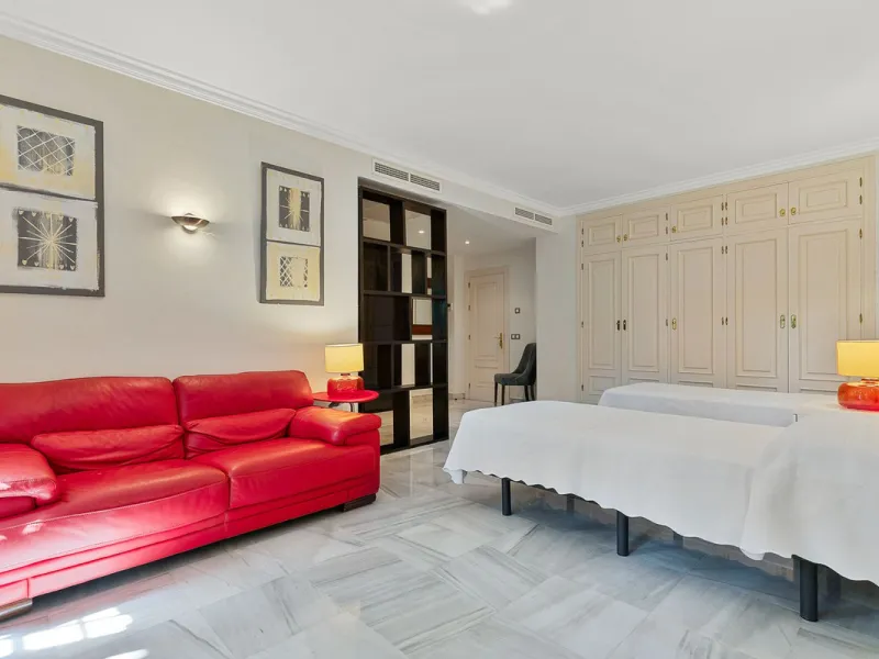 This classic Andalusian-style villa, set within the prestigious residential enclave of Casasola, Guadalmina Baja, represents a rare opportunity to acquire a substantial family home just moments from the sea, with exceptional scope for refurbishment and pe