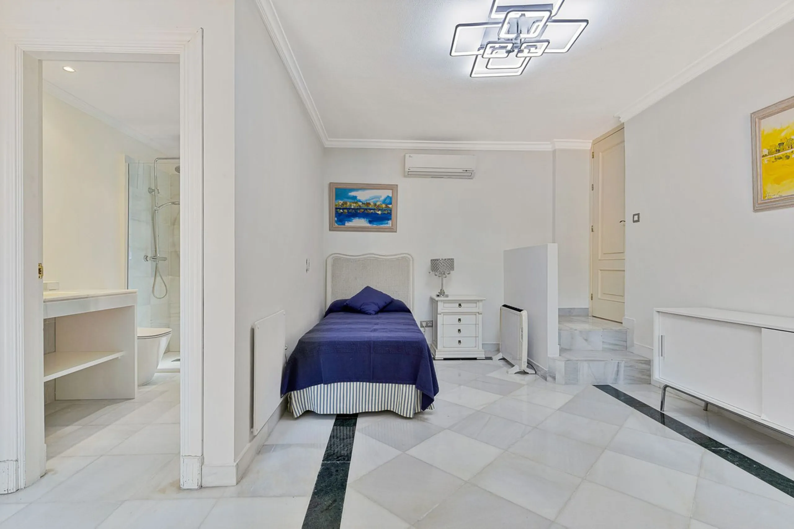 This classic Andalusian-style villa, set within the prestigious residential enclave of Casasola, Guadalmina Baja, represents a rare opportunity to acquire a substantial family home just moments from the sea, with exceptional scope for refurbishment and pe