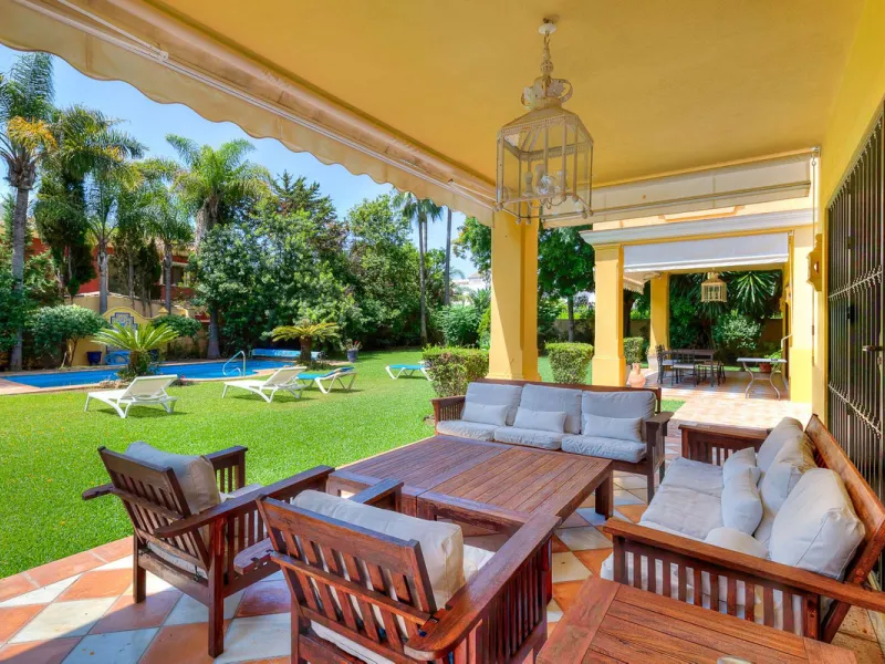 This classic Andalusian-style villa, set within the prestigious residential enclave of Casasola, Guadalmina Baja, represents a rare opportunity to acquire a substantial family home just moments from the sea, with exceptional scope for refurbishment and pe