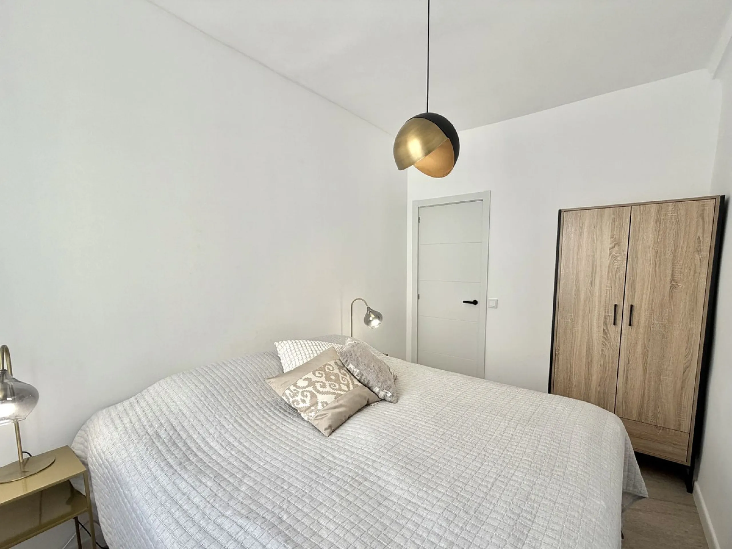 Welcome home to your own oasis on the third floor in Fuengirola! Here you'll find a bright and well-planned two-bedroom apartment (no lift), with access to a spacious shared rooftop terrace. The location is hard to beat, with just 600 meters from the beac