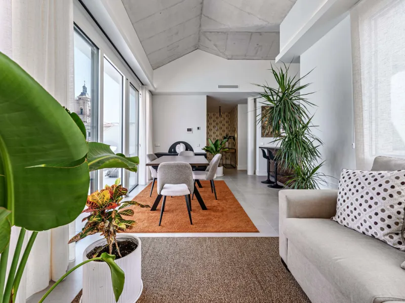 This stunning penthouse is located in a charming four-storey building constructed in 2021, right in the heart of Malaga's Historic Centre. With 122 m² of built area and two terraces totaling 52 m², the property boasts a sleek contemporary design and high-