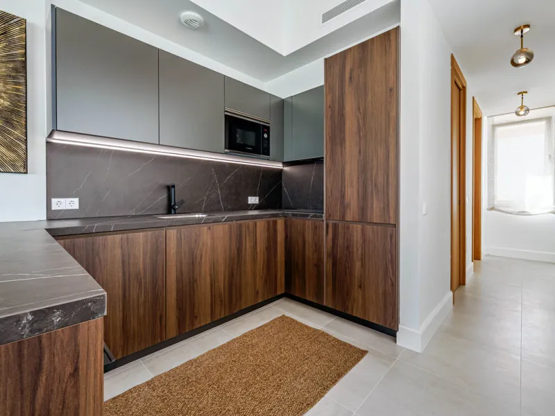 This stunning penthouse is located in a charming four-storey building constructed in 2021, right in the heart of Malaga's Historic Centre. With 122 m² of built area and two terraces totaling 52 m², the property boasts a sleek contemporary design and high-