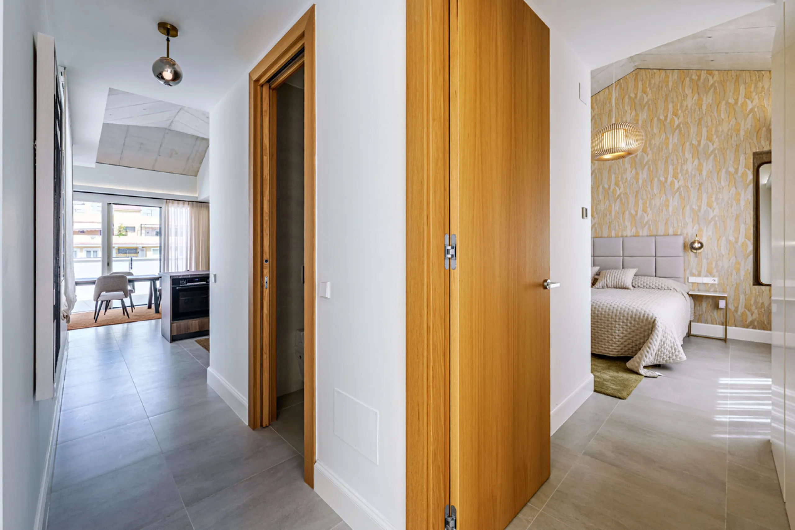 This stunning penthouse is located in a charming four-storey building constructed in 2021, right in the heart of Malaga's Historic Centre. With 122 m² of built area and two terraces totaling 52 m², the property boasts a sleek contemporary design and high-