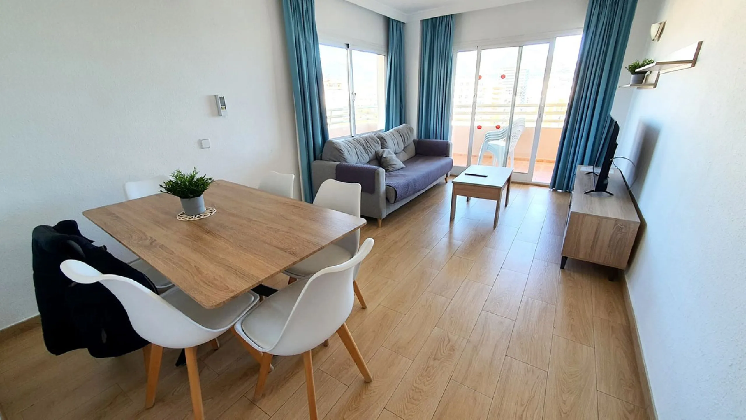 Lovely 2 bedroom apartment front line beach with a large wrap around terrace. This property offers a double bedroom and smaller one, fully equipped kitchen, bathroom and lounge dining with terrace, boasting stunning sea and mountain views. It isset in a b