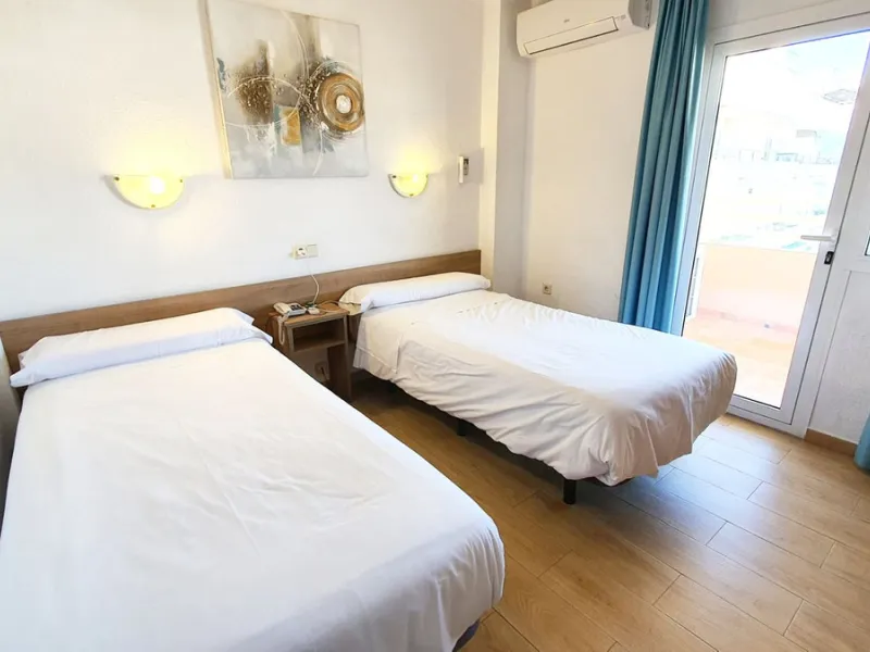 Lovely 2 bedroom apartment front line beach with a large wrap around terrace. This property offers a double bedroom and smaller one, fully equipped kitchen, bathroom and lounge dining with terrace, boasting stunning sea and mountain views. It isset in a b