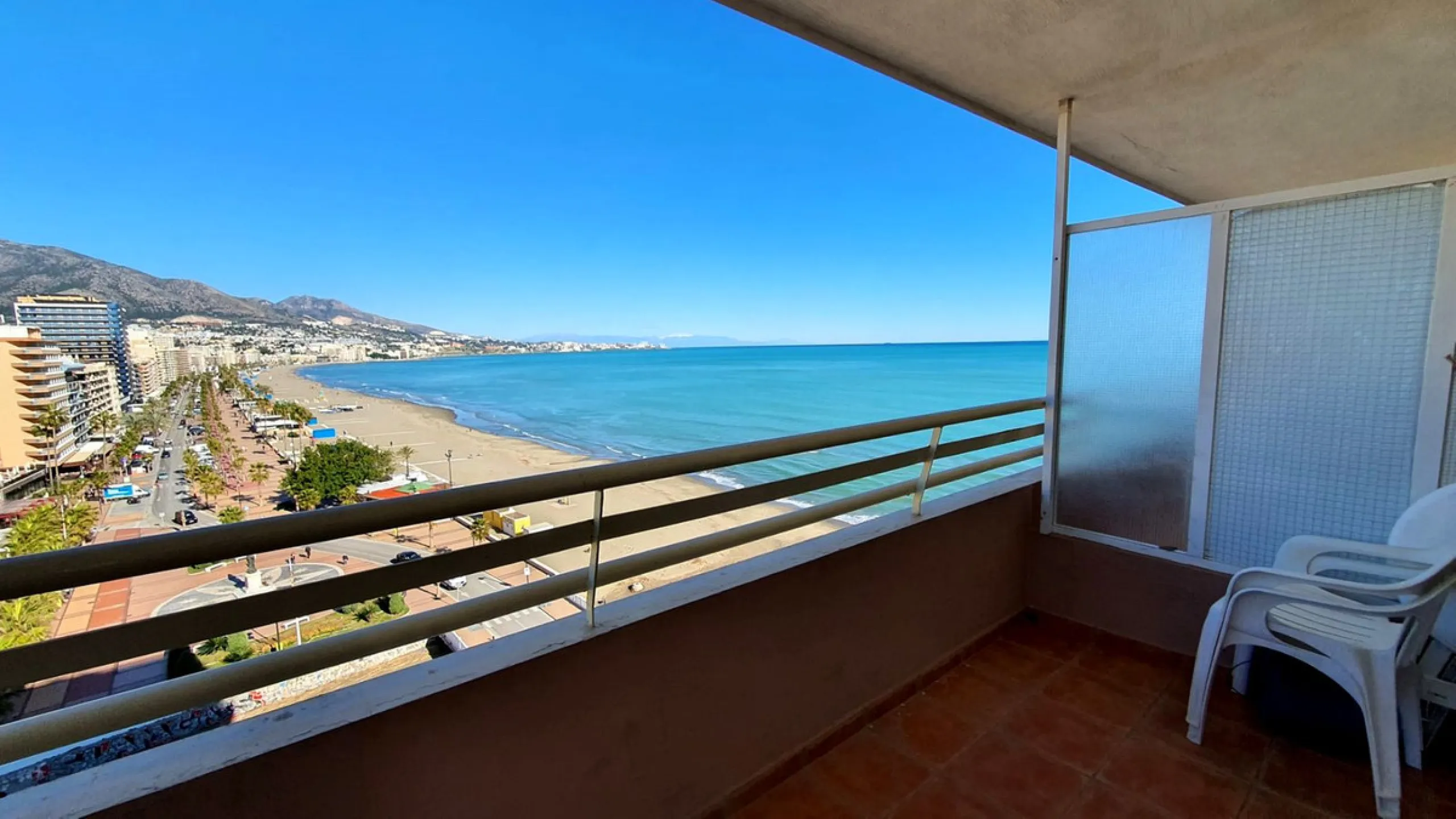 Lovely 2 bedroom apartment front line beach with a large wrap around terrace. This property offers a double bedroom and smaller one, fully equipped kitchen, bathroom and lounge dining with terrace, boasting stunning sea and mountain views. It isset in a b