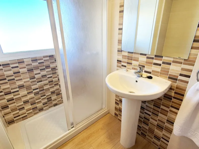 Lovely 2 bedroom apartment front line beach with a large wrap around terrace. This property offers a double bedroom and smaller one, fully equipped kitchen, bathroom and lounge dining with terrace, boasting stunning sea and mountain views. It isset in a b