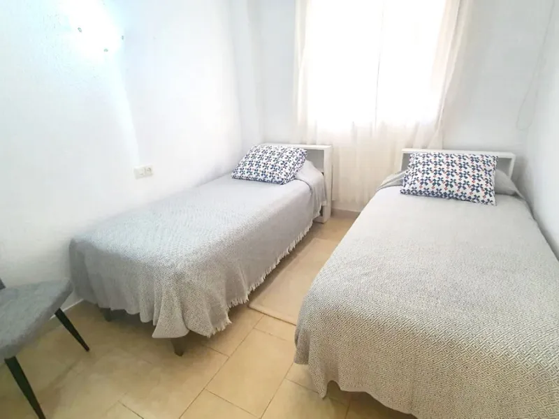 In a front line beach buiding in Los Boliches, 3 bedroom apartment looking at the back street with no sea views but afternoon sun. The property is in a need of a renovation but well presented. Excellent location close to all amenities. Ideal for holidays.