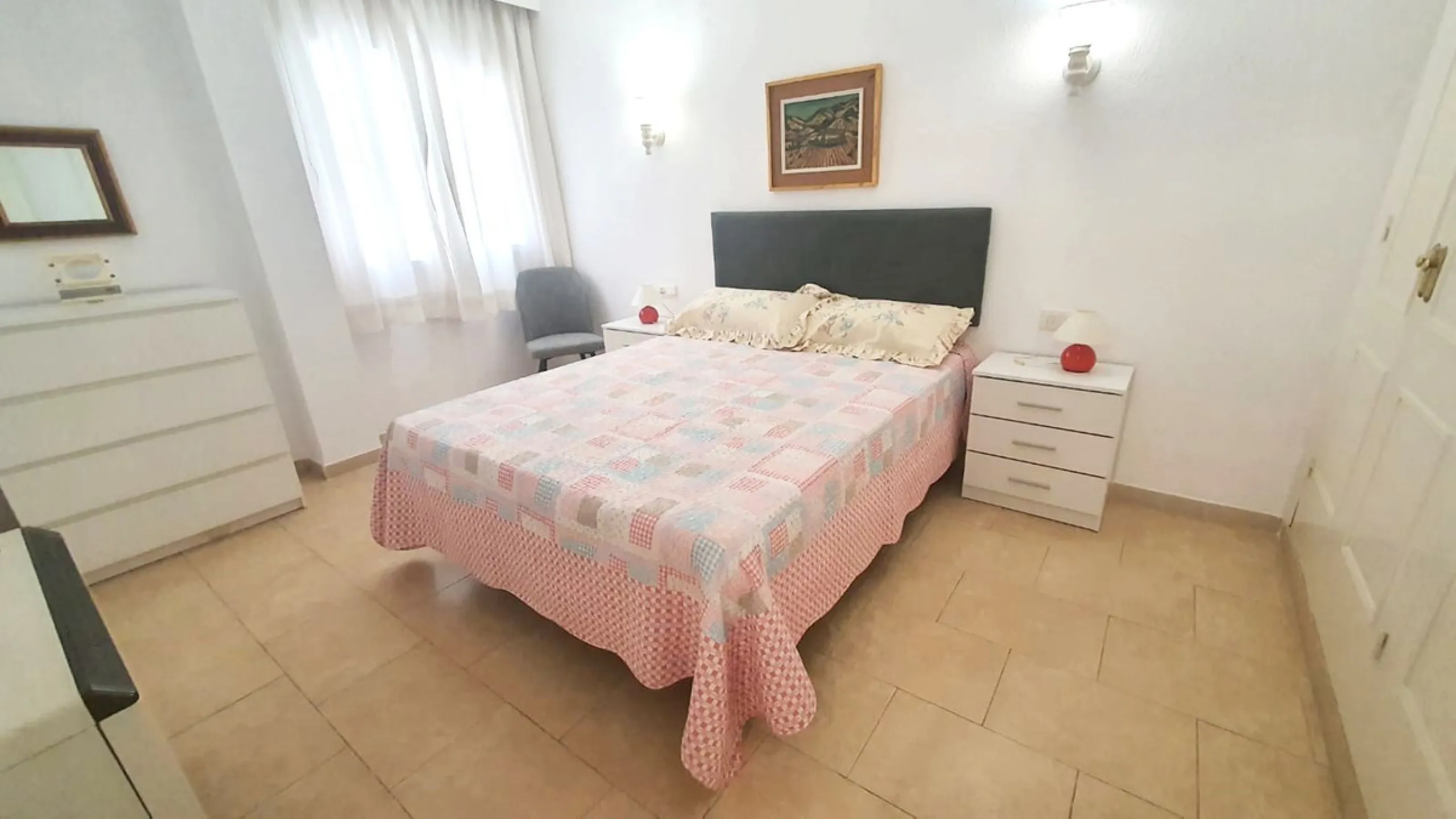 In a front line beach buiding in Los Boliches, 3 bedroom apartment looking at the back street with no sea views but afternoon sun. The property is in a need of a renovation but well presented. Excellent location close to all amenities. Ideal for holidays.