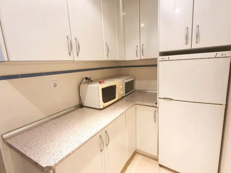 In a front line beach buiding in Los Boliches, 3 bedroom apartment looking at the back street with no sea views but afternoon sun. The property is in a need of a renovation but well presented. Excellent location close to all amenities. Ideal for holidays.