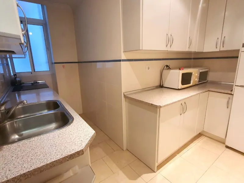 In a front line beach buiding in Los Boliches, 3 bedroom apartment looking at the back street with no sea views but afternoon sun. The property is in a need of a renovation but well presented. Excellent location close to all amenities. Ideal for holidays.