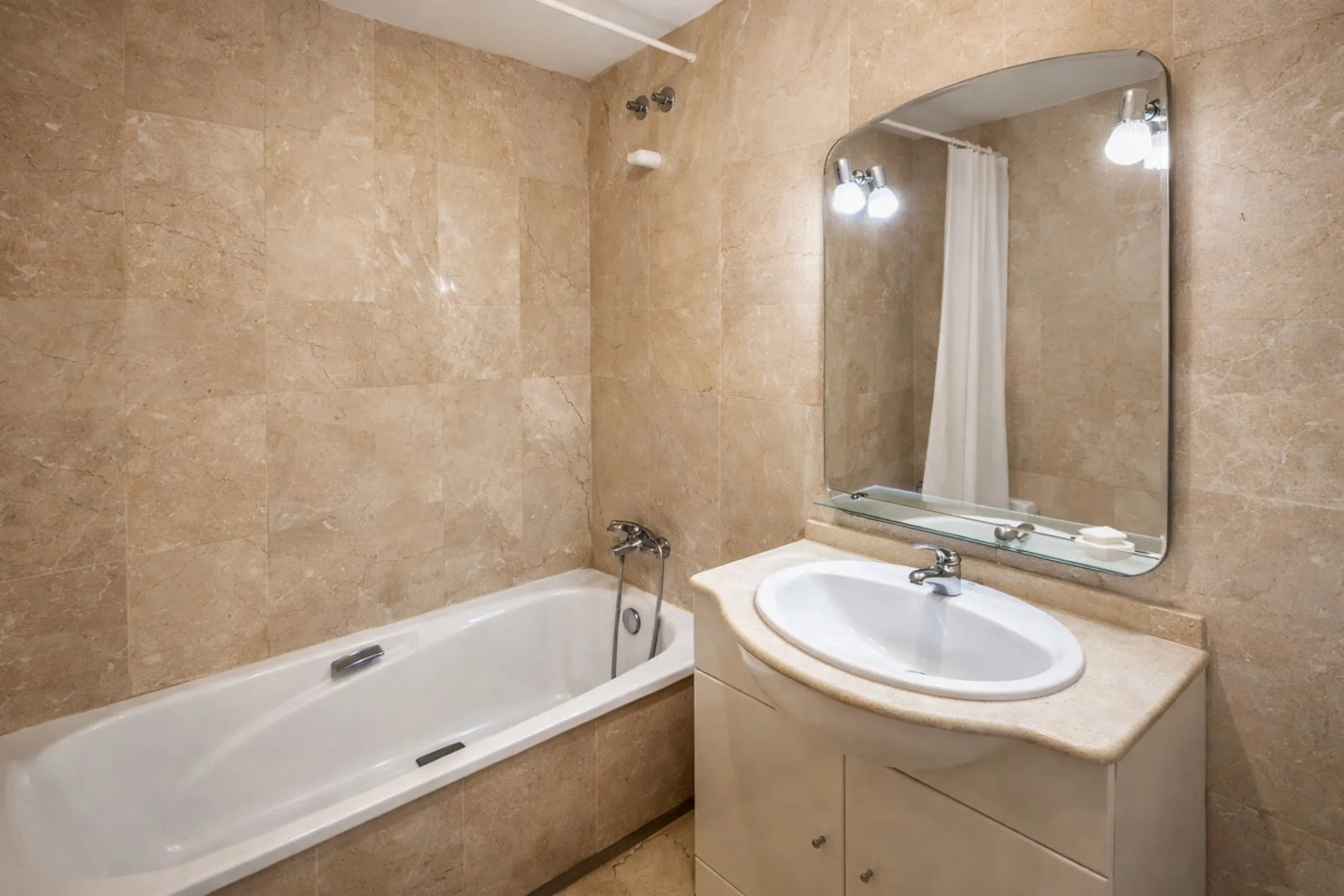 Located in one of the most established and highly regarded private residential communities in Guadalmina, this attractive apartment enjoys a prime frontline golf position and offers a peaceful, elegant setting surrounded by greenery. A versatile property,