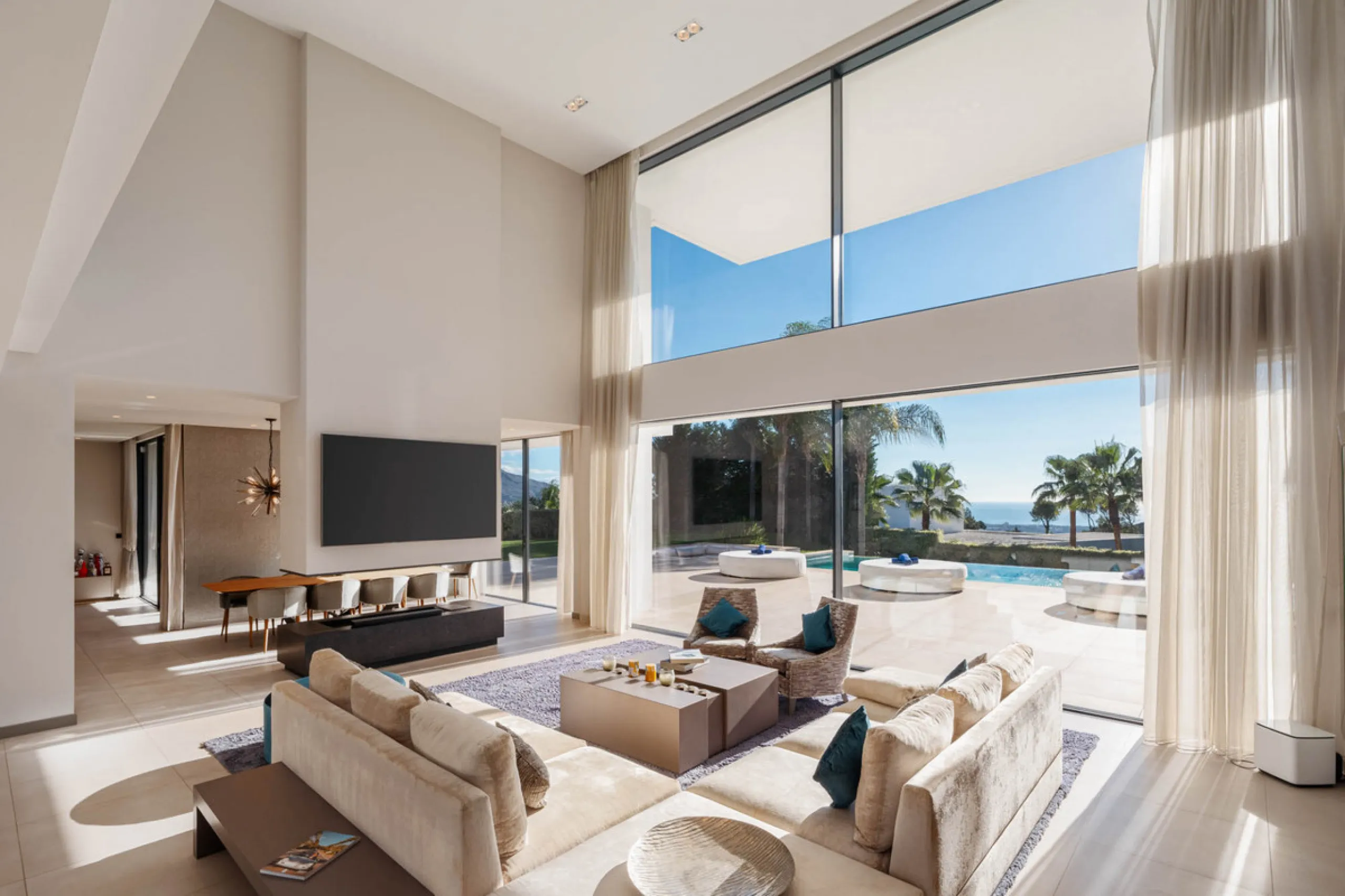 Designed by a distinguished architect, this villa is spread over two levels with an impressive built area. It features five luxurious bedrooms, each with its ensuite bathroom, an additional guest toilet, and a guest apartment that matches the main villa's