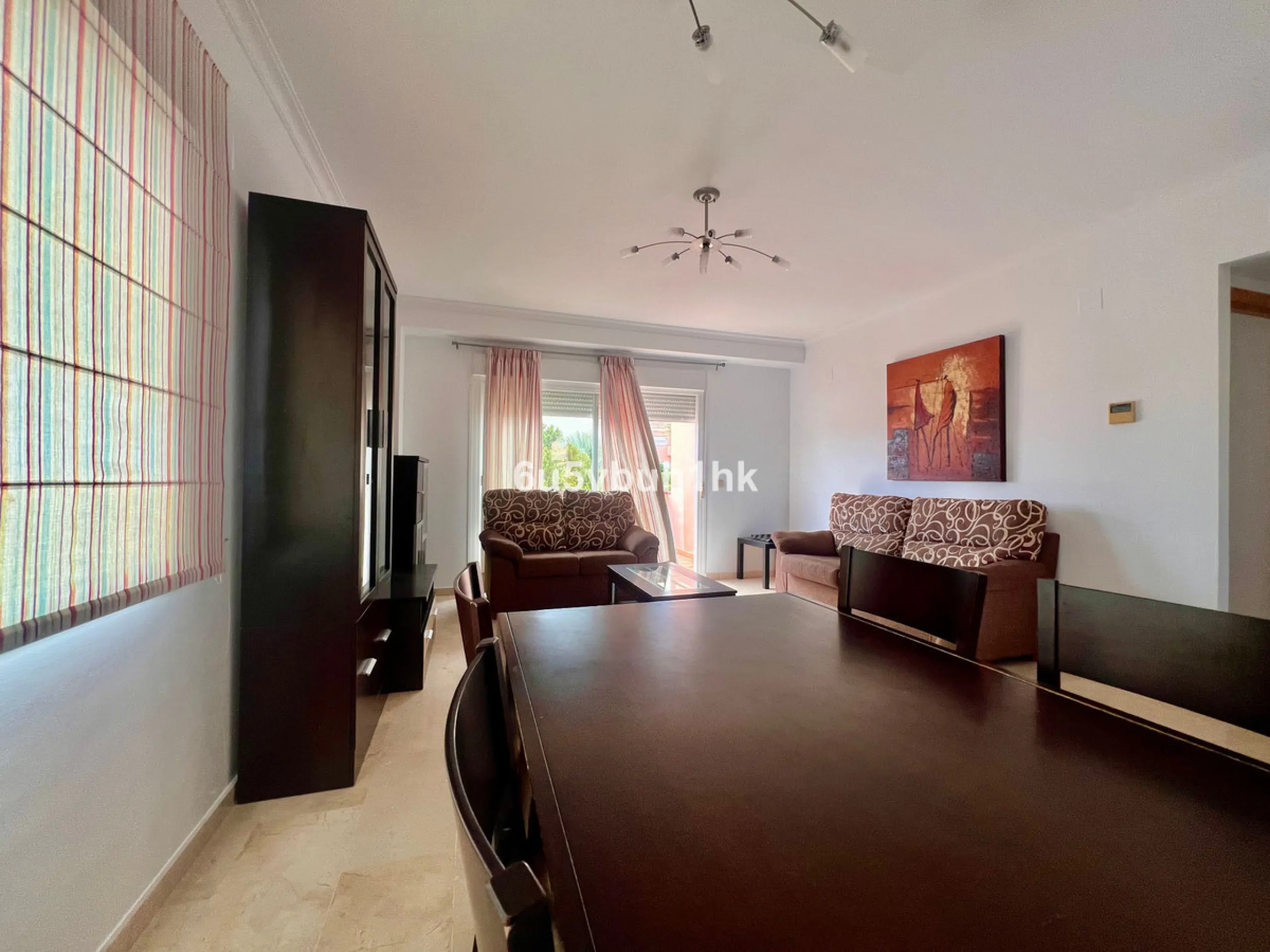 Bright apartment of 83 m² located in the exclusive Montemarina Residential Complex, within a private and peaceful gated community. The property stands out for its excellent orientation, ensuring sunlight throughout the day, and its open sea views from the