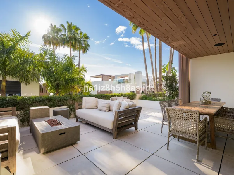 Set within the prestigious Le Blanc development in Sierra Blanca, one of Marbella's most sought-after residential enclaves, this exceptional semi-detached villa offers refined luxury living just six minutes from the beach and within walking distance of se