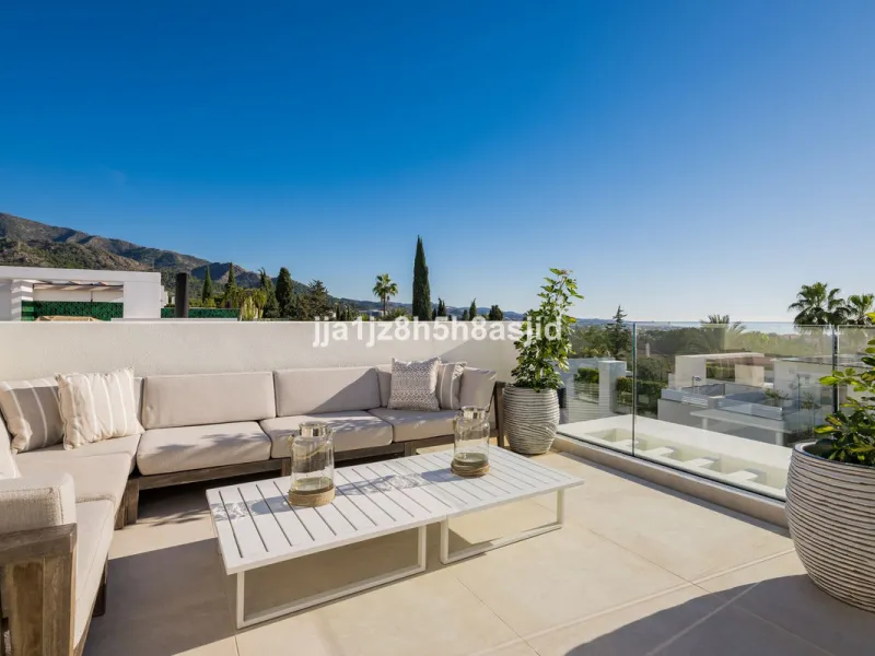 Set within the prestigious Le Blanc development in Sierra Blanca, one of Marbella's most sought-after residential enclaves, this exceptional semi-detached villa offers refined luxury living just six minutes from the beach and within walking distance of se