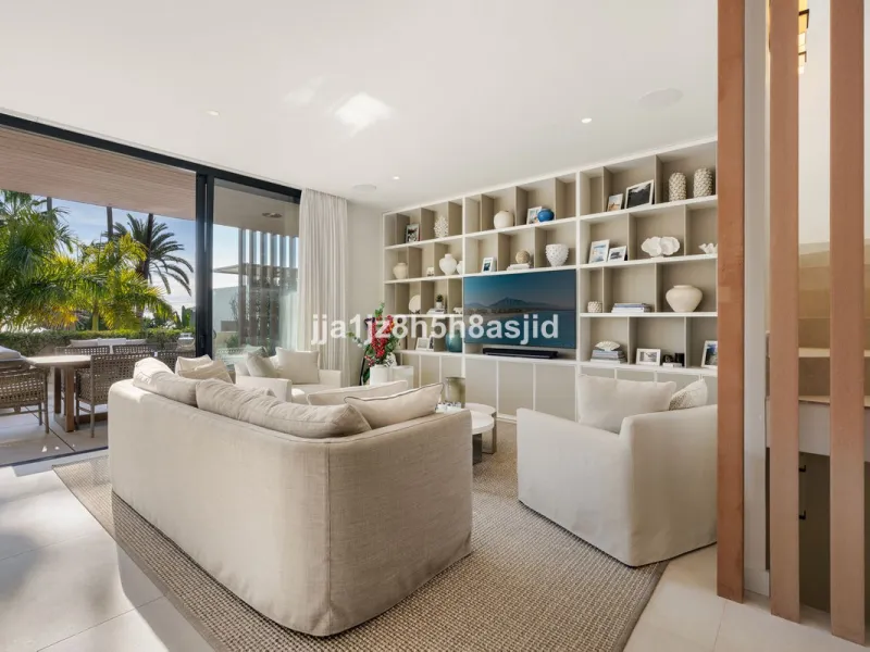 Set within the prestigious Le Blanc development in Sierra Blanca, one of Marbella's most sought-after residential enclaves, this exceptional semi-detached villa offers refined luxury living just six minutes from the beach and within walking distance of se