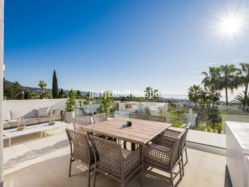 Set within the prestigious Le Blanc development in Sierra Blanca, one of Marbella's most sought-after residential enclaves, this exceptional semi-detached villa offers refined luxury living just six minutes from the beach and within walking distance of se