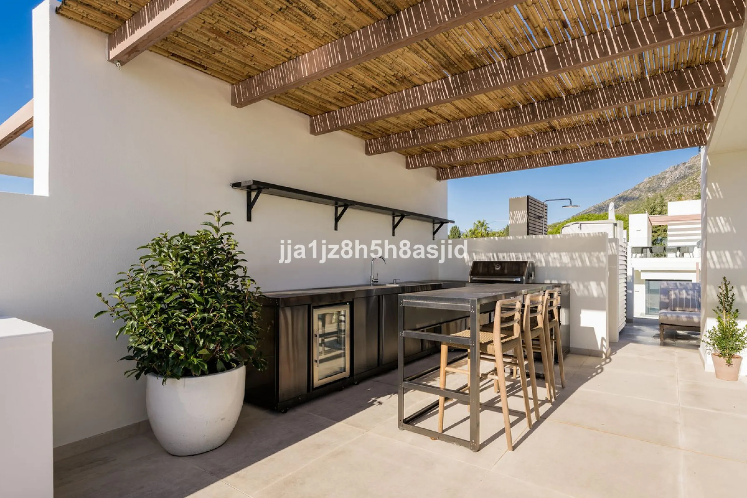 Set within the prestigious Le Blanc development in Sierra Blanca, one of Marbella's most sought-after residential enclaves, this exceptional semi-detached villa offers refined luxury living just six minutes from the beach and within walking distance of se
