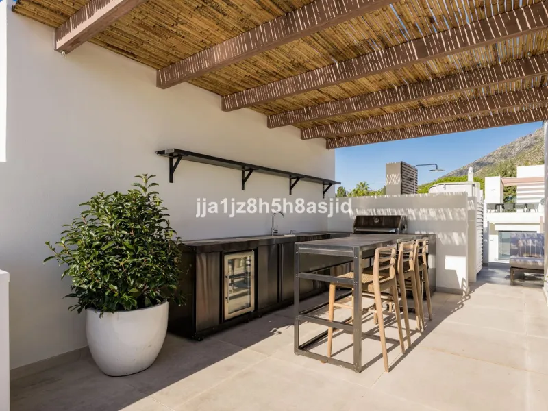 Set within the prestigious Le Blanc development in Sierra Blanca, one of Marbella's most sought-after residential enclaves, this exceptional semi-detached villa offers refined luxury living just six minutes from the beach and within walking distance of se
