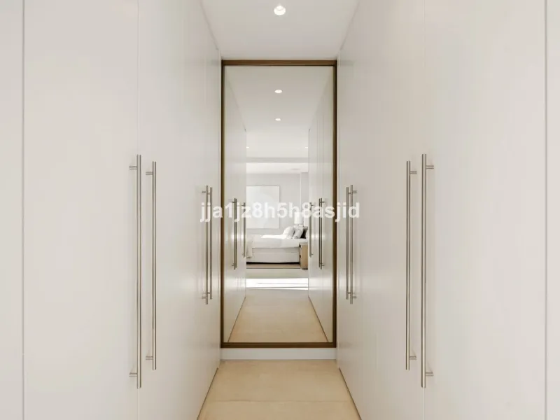 Set within the prestigious Le Blanc development in Sierra Blanca, one of Marbella's most sought-after residential enclaves, this exceptional semi-detached villa offers refined luxury living just six minutes from the beach and within walking distance of se