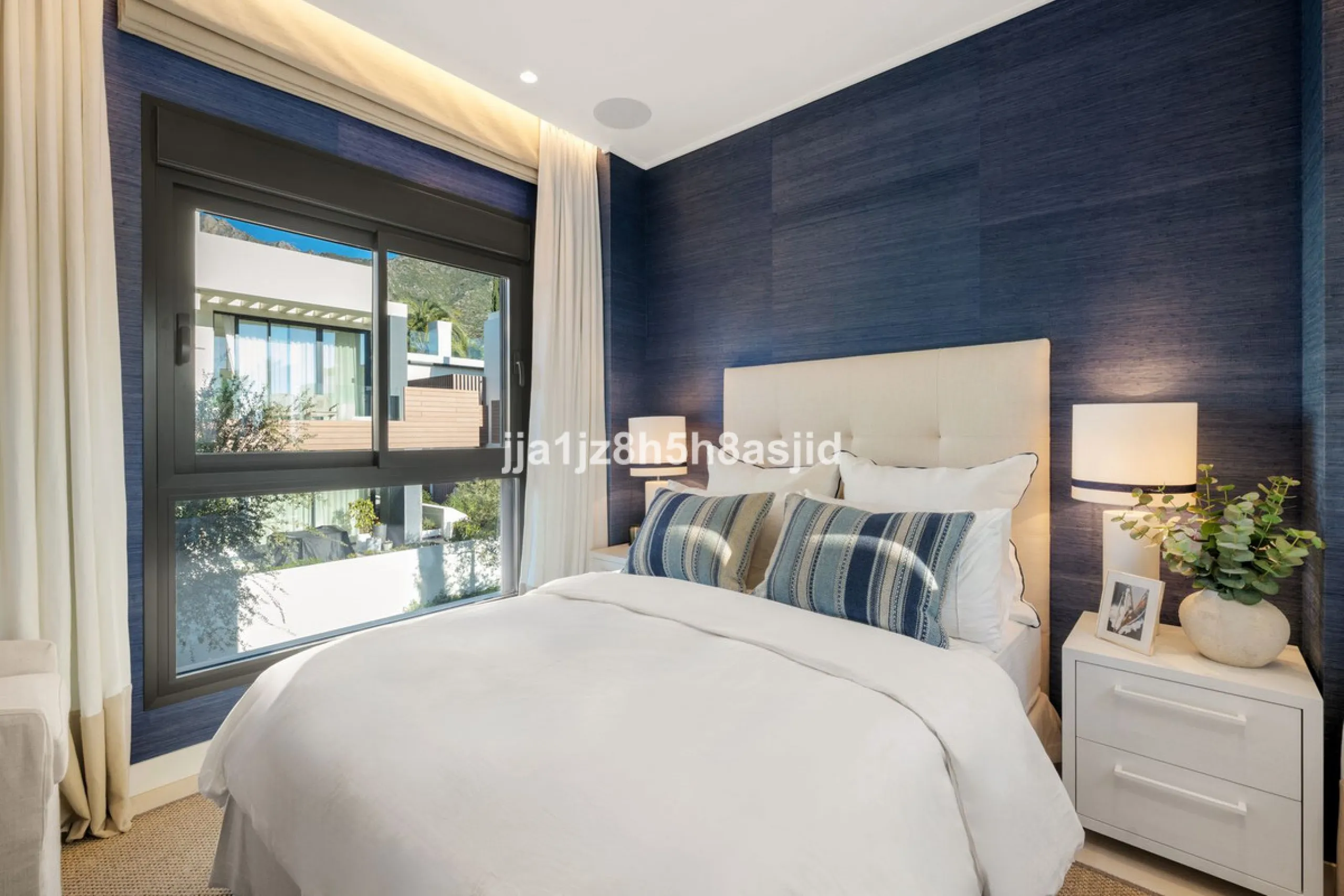 Set within the prestigious Le Blanc development in Sierra Blanca, one of Marbella's most sought-after residential enclaves, this exceptional semi-detached villa offers refined luxury living just six minutes from the beach and within walking distance of se