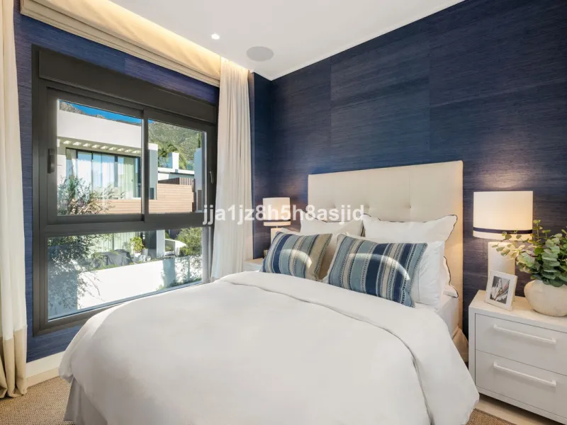 Set within the prestigious Le Blanc development in Sierra Blanca, one of Marbella's most sought-after residential enclaves, this exceptional semi-detached villa offers refined luxury living just six minutes from the beach and within walking distance of se