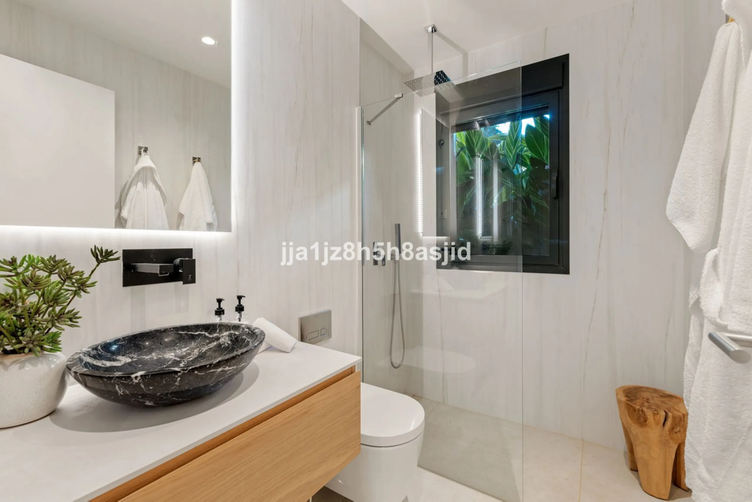 Set within the prestigious Le Blanc development in Sierra Blanca, one of Marbella's most sought-after residential enclaves, this exceptional semi-detached villa offers refined luxury living just six minutes from the beach and within walking distance of se