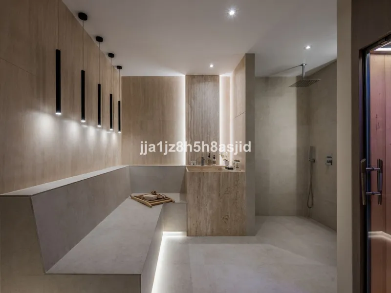 Set within the prestigious Le Blanc development in Sierra Blanca, one of Marbella's most sought-after residential enclaves, this exceptional semi-detached villa offers refined luxury living just six minutes from the beach and within walking distance of se