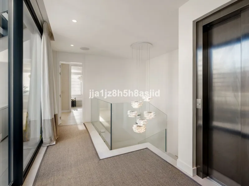 Set within the prestigious Le Blanc development in Sierra Blanca, one of Marbella's most sought-after residential enclaves, this exceptional semi-detached villa offers refined luxury living just six minutes from the beach and within walking distance of se