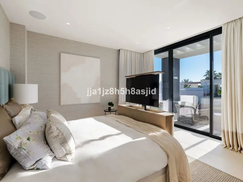 Set within the prestigious Le Blanc development in Sierra Blanca, one of Marbella's most sought-after residential enclaves, this exceptional semi-detached villa offers refined luxury living just six minutes from the beach and within walking distance of se