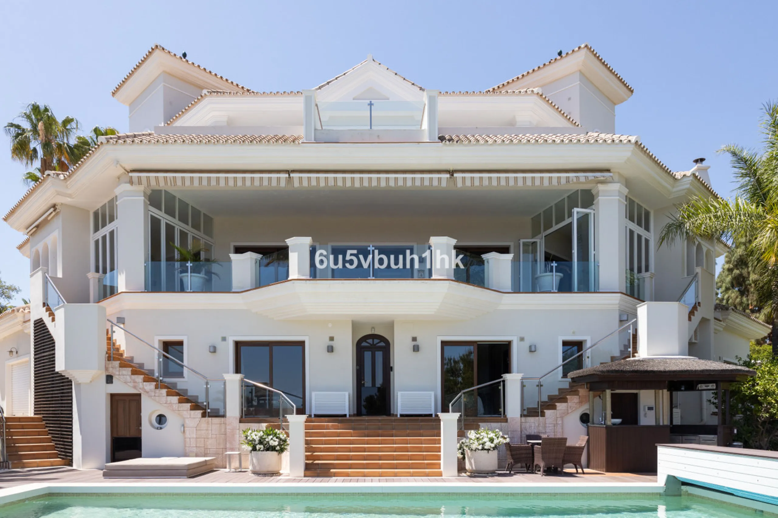 Nestled on a spacious 3,920 square meter plot, this generational Estate boasts a total built area of 842 square meters, spread across four floors with an elevator, located in one of Marbella's prime urbanizations. Surrounded by the lush nature of Las Chap