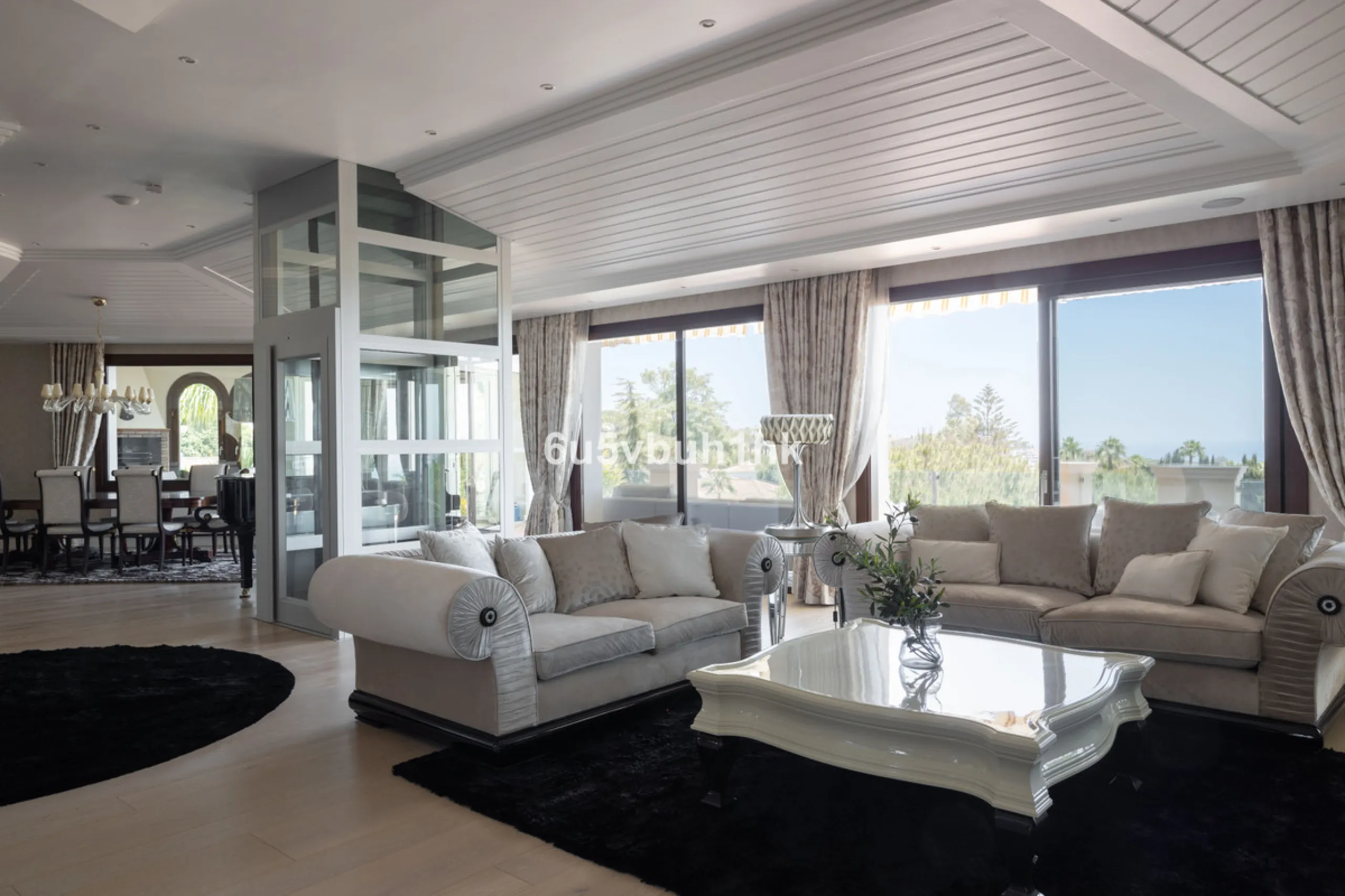 Nestled on a spacious 3,920 square meter plot, this generational Estate boasts a total built area of 842 square meters, spread across four floors with an elevator, located in one of Marbella's prime urbanizations. Surrounded by the lush nature of Las Chap