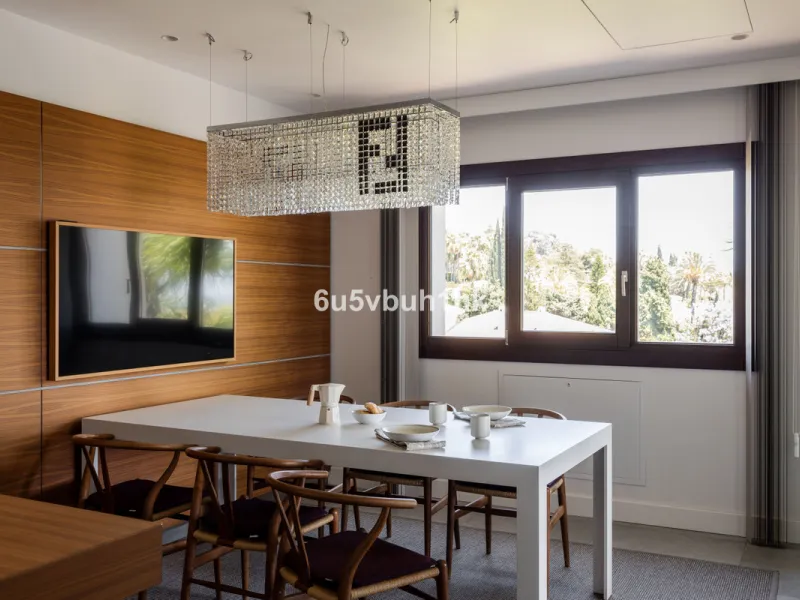 Nestled on a spacious 3,920 square meter plot, this generational Estate boasts a total built area of 842 square meters, spread across four floors with an elevator, located in one of Marbella's prime urbanizations. Surrounded by the lush nature of Las Chap