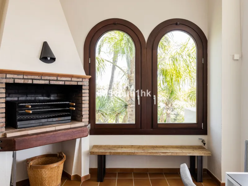 Nestled on a spacious 3,920 square meter plot, this generational Estate boasts a total built area of 842 square meters, spread across four floors with an elevator, located in one of Marbella's prime urbanizations. Surrounded by the lush nature of Las Chap