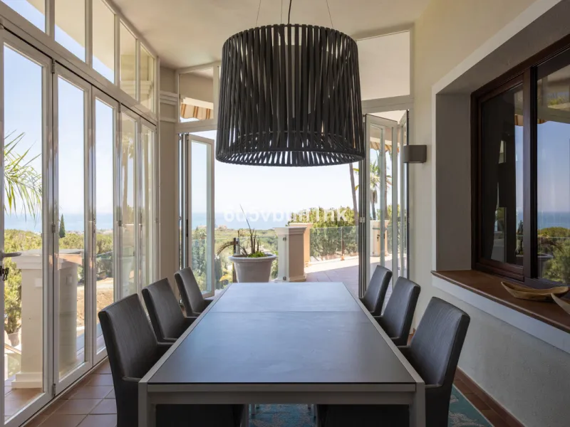 Nestled on a spacious 3,920 square meter plot, this generational Estate boasts a total built area of 842 square meters, spread across four floors with an elevator, located in one of Marbella's prime urbanizations. Surrounded by the lush nature of Las Chap