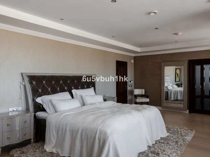 Nestled on a spacious 3,920 square meter plot, this generational Estate boasts a total built area of 842 square meters, spread across four floors with an elevator, located in one of Marbella's prime urbanizations. Surrounded by the lush nature of Las Chap