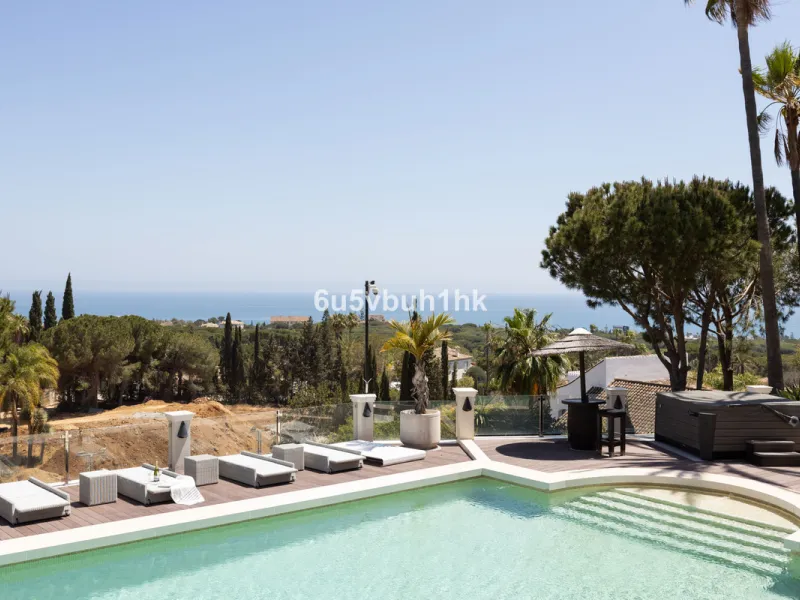 Nestled on a spacious 3,920 square meter plot, this generational Estate boasts a total built area of 842 square meters, spread across four floors with an elevator, located in one of Marbella's prime urbanizations. Surrounded by the lush nature of Las Chap