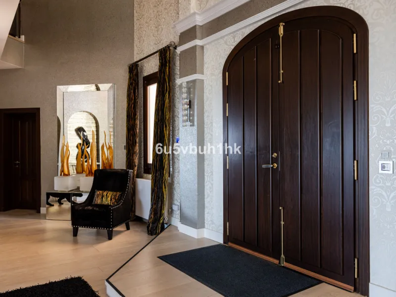 Nestled on a spacious 3,920 square meter plot, this generational Estate boasts a total built area of 842 square meters, spread across four floors with an elevator, located in one of Marbella's prime urbanizations. Surrounded by the lush nature of Las Chap