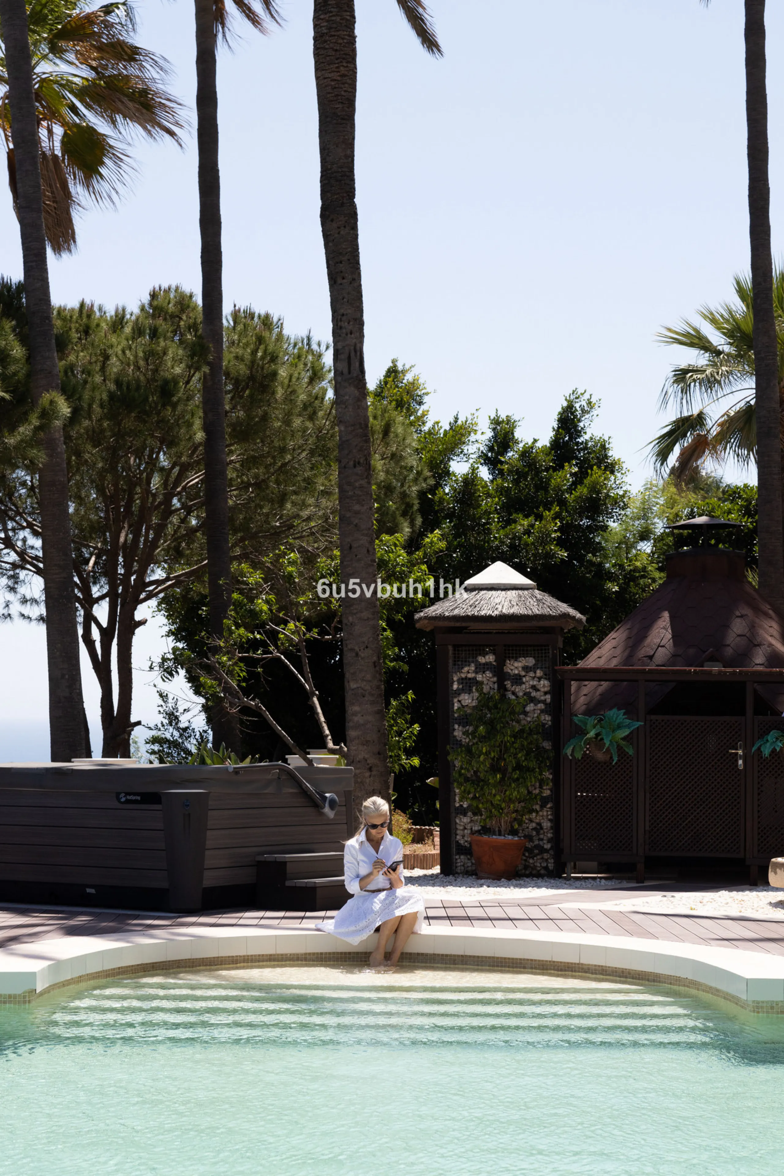 Nestled on a spacious 3,920 square meter plot, this generational Estate boasts a total built area of 842 square meters, spread across four floors with an elevator, located in one of Marbella's prime urbanizations. Surrounded by the lush nature of Las Chap